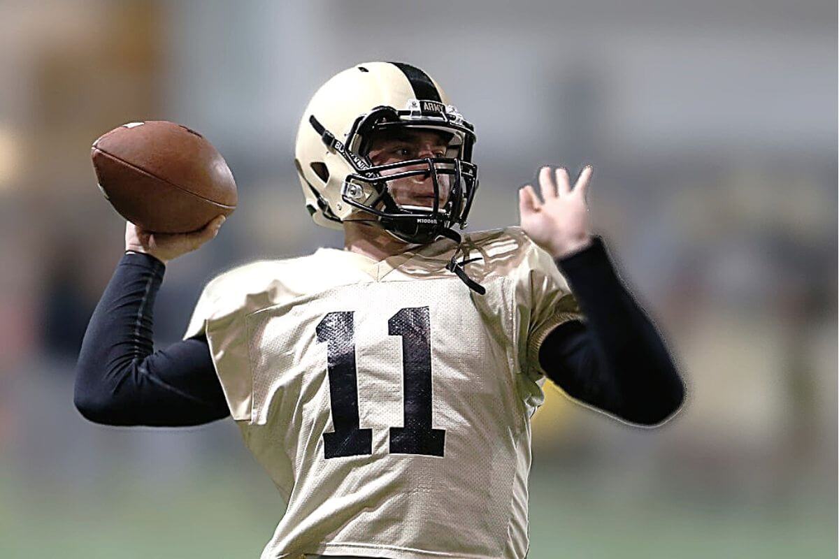 NFL quarterback throwing